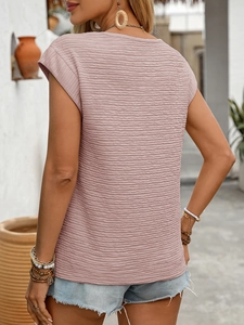 Detail of pink textured T-shirt featuring elegant horizontal pleats and back view design
