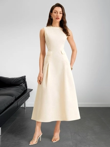 Elegant sleeveless A-line dress in cream white with side pockets and pleated skirt detail