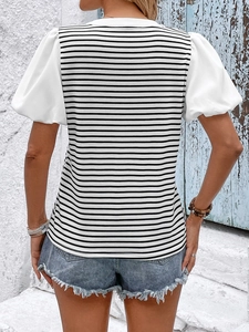 Back view of women's striped T-shirt with white puff sleeves and casual chic style