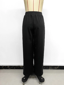 Back view of black high waist wide leg trousers with elastic waistband on a mannequin