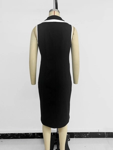Rear view of slim fit sleeveless dress with contrast white lapel and back slit detail