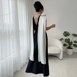 Elegant black and white contrast V-neck evening gown with 3D flower and silk cape