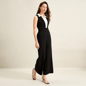 Combinaison pantalon bicolore chic sans manches avec taille haute et jambes larges