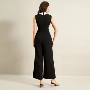 Combinaison pantalon large sans manches noir et blanc élégante avec col blanc et taille haute