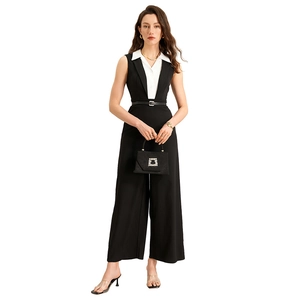 Combinaison élégante sans manches à jambes larges avec bloc de couleurs noir et blanc
