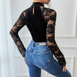 Elegant black velvet bodysuit with floral lace sleeves and high neck for party wear