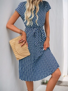 Navy blue geometric print dress with round neck, waist tie and pleated skirt