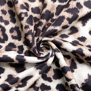 Macro shot showing soft texture and high-density leopard print fabric for women's maxi dress