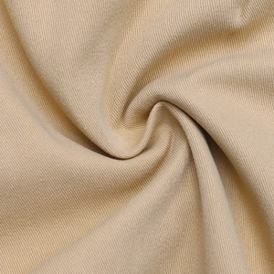 Dettaglio del tessuto twill kaki che mostra la trama per gonne pantalone Y2K