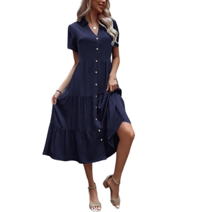 Elegant navy blue short sleeve midi shirt dress with button details and tiered skirt