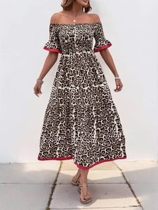 Detailed tiered leopard print dress featuring off-shoulder smocking and red trim accents