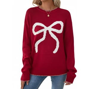 Women's red knit Christmas sweater with a large white bow intarsia and contrast stitching