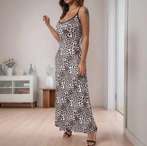 Sleek leopard print maxi dress with V-neckline and thin straps for a stylish summer look