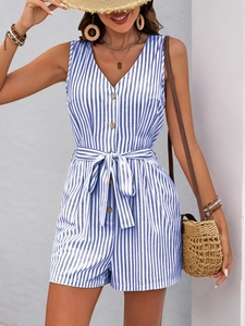 Close-up of blue and white striped summer romper with deep V-neck and button details
