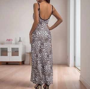 Sexy leopard print backless maxi dress for women featuring sleek black spaghetti straps