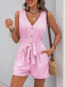 Detail of pink striped romper with V-neck, wood buttons and waist tie detail
