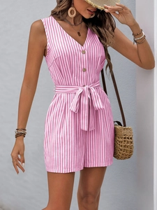 Detail of pink and white striped romper with V-neck, vintage buttons and waist tie