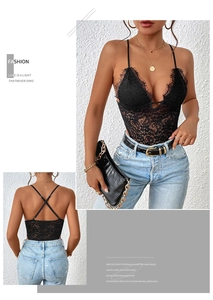Close-up of deep V-neck black lace bodysuit with eyelash trim and floral embroidery