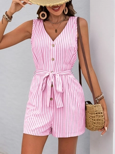 Detail of pink and white striped romper featuring a deep V-neck and buttoned front