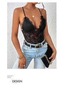 Close-up of black floral eyelash lace detail on a sexy deep V-neck sleeveless bodysuit