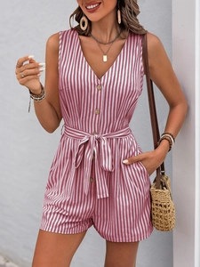 Detail of pink striped romper with V-neck, wooden buttons and waist tie belt