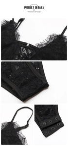 Detail of black eyelash lace bodysuit with adjustable straps and snap closure