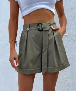 Detailed view of high-waist army green utility shorts with tie belt and marble buckle