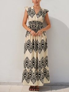 Detailed view of bohemian printed maxi dress with V-neckline and elastic high waist