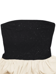 Close-up of black sequin bodice with cream pleated fabric detail on bandeau top