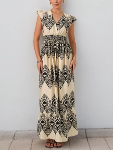 Close-up of bohemian ethnic print maxi dress with V-neck and ruffled butterfly sleeves