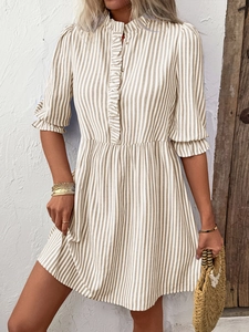 Detail of ruffled stand collar and puff sleeves on khaki striped A-line summer dress
