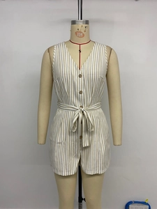 Detailed front view of V-neck striped romper with wood-texture buttons and waist tie bow