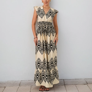 Bohemian V-neck floral maxi dress with flutter sleeves and high waist printed design
