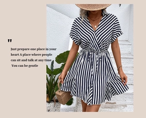 Detail of the waist drawstring and vertical blue and white stripes on this summer dress