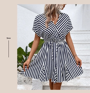 Detailed view of women's summer striped dress featuring V-neckline and waist tie design