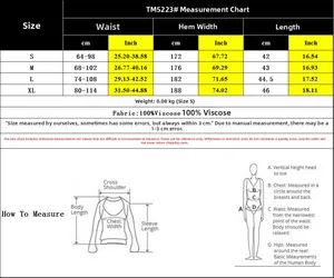 Detailed size chart for ethnic floral mini skirt showing measurements and material data