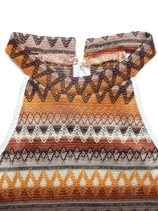 Detail view of the halter neckline on this crochet knit set with zigzag wavy patterns