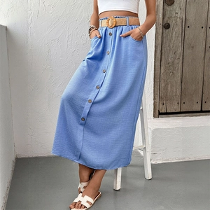 Women's blue midi skirt with straw belt, elastic high waist, and button front detail