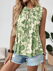 Detail of bohemian sleeveless shirt with floral print, neckline ties and vertical pleats