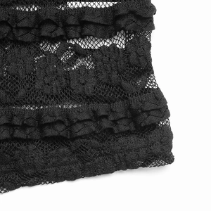 Detail shot of black floral embroidery lace and tiered ruffle layers on a slim fit camisole