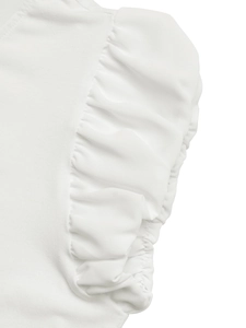Detail of white summer T-shirt featuring elegant ruffle bubble sleeves and cotton texture