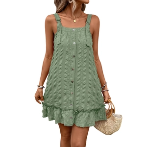 Green textured mini dress with adjustable straps and ruffle hem for a summer casual look