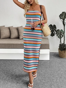 Detail of colorful striped knit maxi dress with side slit for summer beach vacations