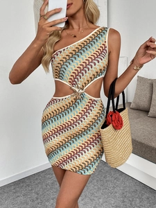 Detail of knit mini dress showing waist cut-out with gold starfish buckle and wave stripes
