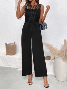 Combinaison noire sans manches avec dentelle florale 3D et jambe large à taille haute