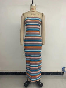 Detailed close-up of knit texture and colorful horizontal stripes on tube maxi dress