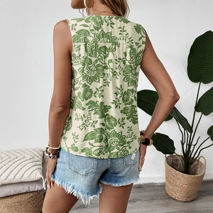 Women's summer sleeveless pleated floral blouse with tied back for casual beach style