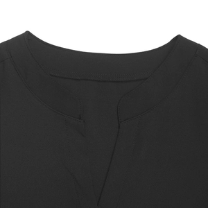 Close-up of V-neck stand-up collar with detailed double-line stitching on black lace blouse