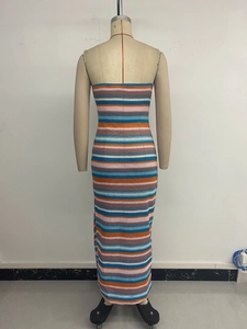 Detailed back view of a colorful striped knit tube dress with a slit and slimming fit