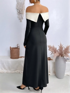 Elegant black maxi dress with white off-the-shoulder collar and side slit detail